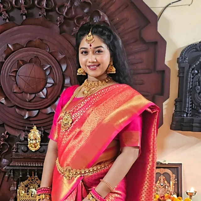 Thathpara Ahoratra, founder, before a carved Śrī Yantra